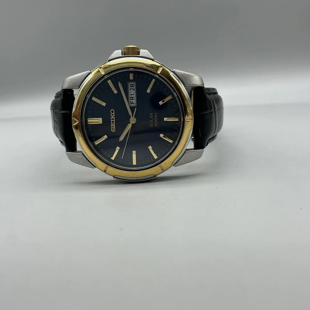 Seiko Solar Mens Watch 37mm Blue Dial Two Tone Black Leather Day Date V158-0AD0